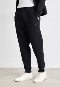 BOSS - HADIKO - Tracksuit bottoms - black Thumbnail Image 1