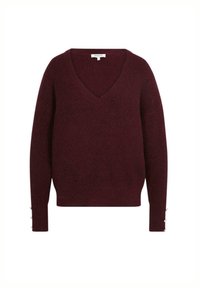 Pull in magenta a maglia con scollatura a V, maniche lunghe e dettagli con bottoni sui polsini. Tessuto morbido con un motivo a costine su tutta la superficie.