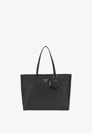 Sac fourre-tout en faux cuir noir avec double poignée, arborant une plaque logo triangulaire et une petite pochette zippée détachable. Texture lisse et design spacieux.