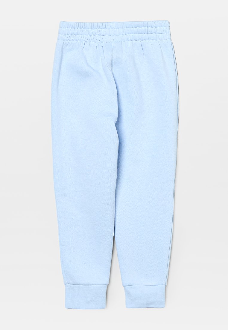Pantalons de survêtement bleu clair en tissu doux, avec une taille élastique et des poignets fuselés aux chevilles pour un ajustement confortable.