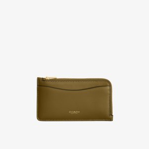 Porte-cartes Coach en cuir vert olive avec fermeture éclair dorée et emplacement pour carte à l'avant, design compact et mince.