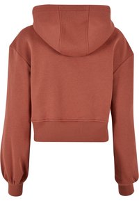 Cropped hoodie in roestoranje, gemaakt van zachte stof. Voorzien van een capuchon, doorgezakte schouders en geribbelde boorden en zoom. Glad oppervlak.