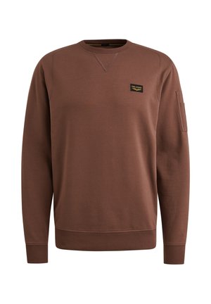Brown cotton sweatshirt with crew neck, ribbed cuffs, and hem. Features a small logo patch on the chest and a pocket on the left sleeve.
