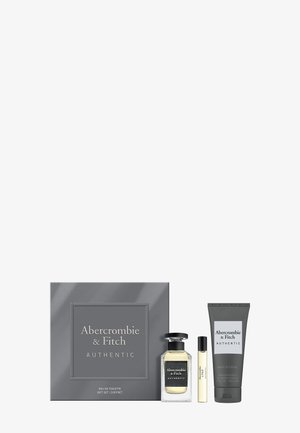 Coffret cadeau authentique Abercrombie & Fitch comprenant une eau de toilette, un roll-on et un gel douche pour cheveux et corps dans un emballage gris.