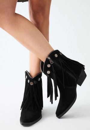 Botines camperos - black