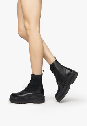 NeroGiardini Platform ankle boots - nero