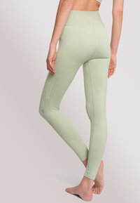 OCEANSAPART RILEY - Leggings - sage green