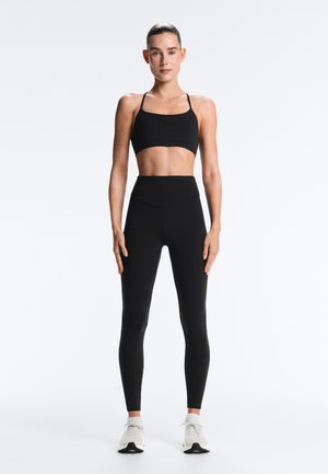 OYSHO COMFORTLUX LIGHT-SUPPORT WITH CROSSOVER STRAPS  - Sport-bh met light support - black