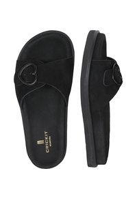 Zwarte sliders van zacht suede met een hartvormige gesp. Plat voetbed en eenvoudig ontwerp voor gemakkelijke draagbaarheid.