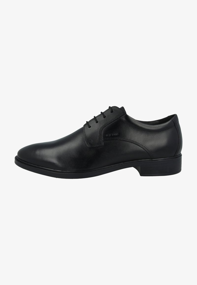 Scarpe da uomo in pelle nera con una finitura liscia, design allacciato, punta arrotondata e dettagli di cucitura discreti. Suola in gomma per una buona aderenza.