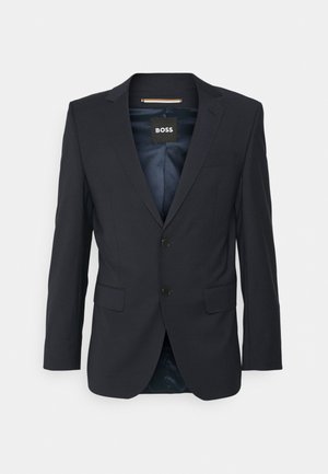 Blazer blu navy realizzato in tessuto morbido, con colletto a preventivo, due tasche frontali, chiusura a doppio bottone e una rivestimento interno liscio.