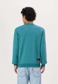 Karl Lagerfeld Jeans SWEATSHIRT - Melegítőfelső - hydro