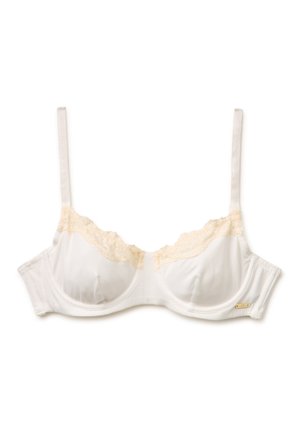 Weißer Bügel-BH mit beiger Spitzenverzierung entlang des oberen Randes und verstellbaren Schulterträgern vor weißem Hintergrund.