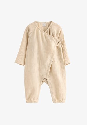 Beigenvärinen vauvan pitkähihaisen haalari, jossa on kietaisumallinen etuosa, joka sidotaan sivulta, teksturoitu kangas ja joustavat resorit nilkoissa.