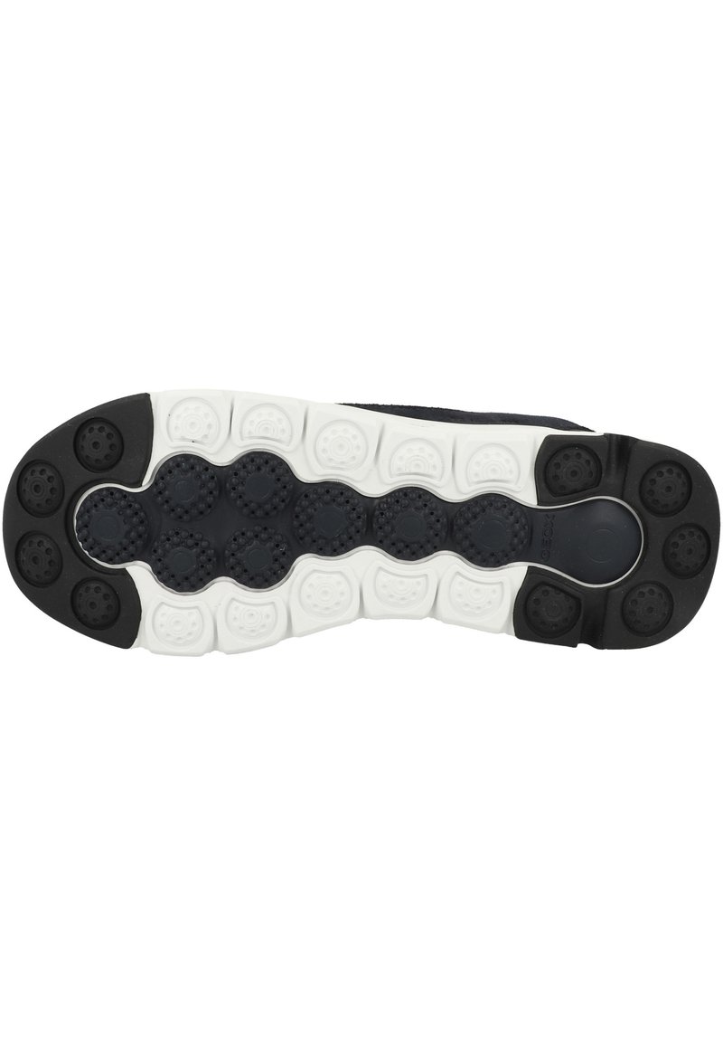 Schwarzer und weißer Schuhsohlendesign mit strukturiertem Grip-Muster, abgerundeten Akzenten und leichtem Design für Komfort.