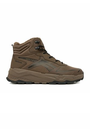 Brązowy wysokiej jakości but do wędrówek Reebok z wyściełanym kołnierzem, czarnymi sznurowadłami, trwałą podeszwą i fakturowaną syntetyczną cholewką.