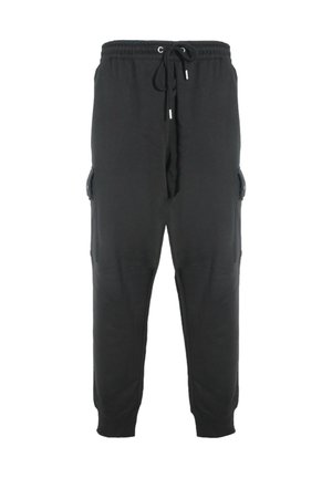 Pantaloni della tuta neri realizzati in materiale morbido, dotati di tasche laterali cargo, vita elastica con cordino e polsini affusolati.