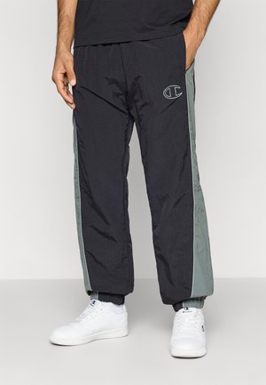 TRACK PANTS - Pantalon de survêtement - green/black