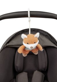 Soft, plush fox toy in orange and cream, with a blue-striped shirt, attached to a black handle with a white clip, above a dark seat.