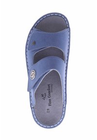 Blue vegan suede slip-on sandal with two adjustable straps, stitched accents, and a circular logo. Soft, textured footbed and minimalist design.