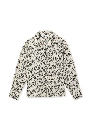 Blusa floreale in crema con motivo floreale nero, maniche lunghe e colletto classico. Tessuto leggero, chiusura con bottoni davanti e vestibilità comoda.