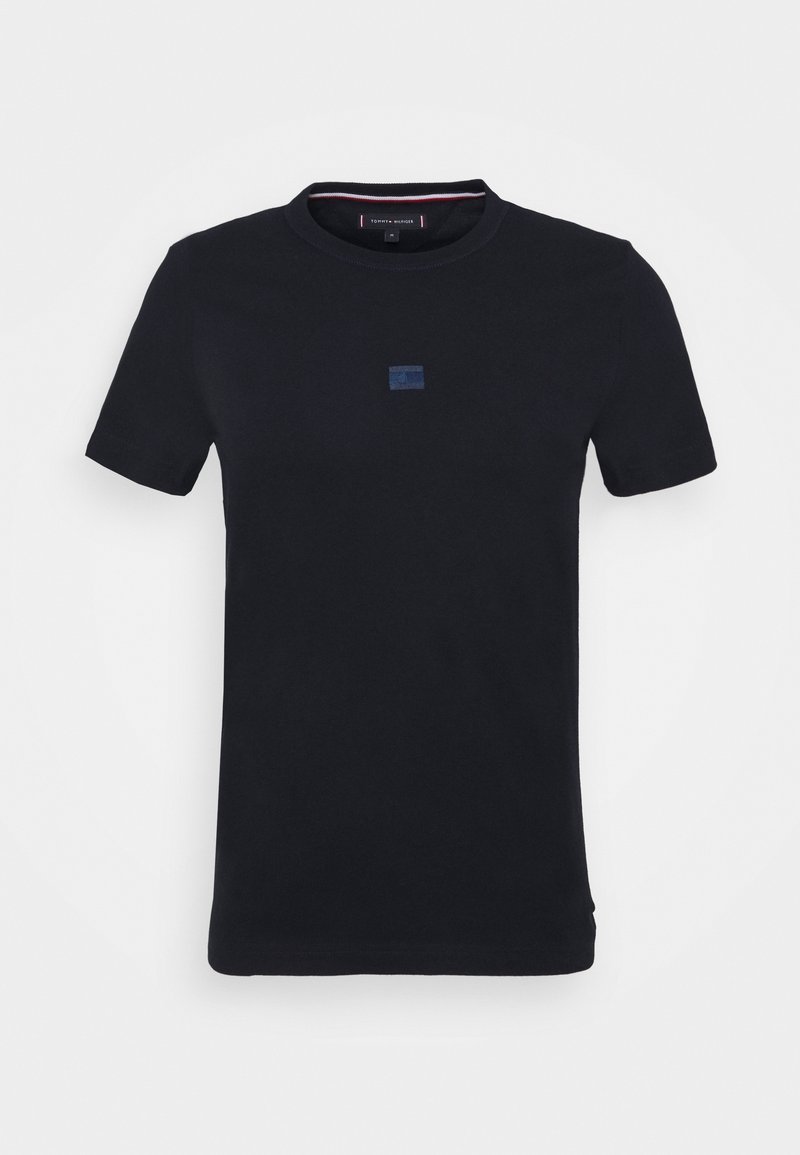 Black cotton t-shirt with a round neckline, short sleeves, and a small blue logo accent on the front. Smooth texture, regular fit.