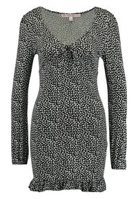 Czarna sukienka z długim rękawem z okrągłym dekoltem, w kwiatowy wzór, dopasowana do ciała, z falbaną na dole.