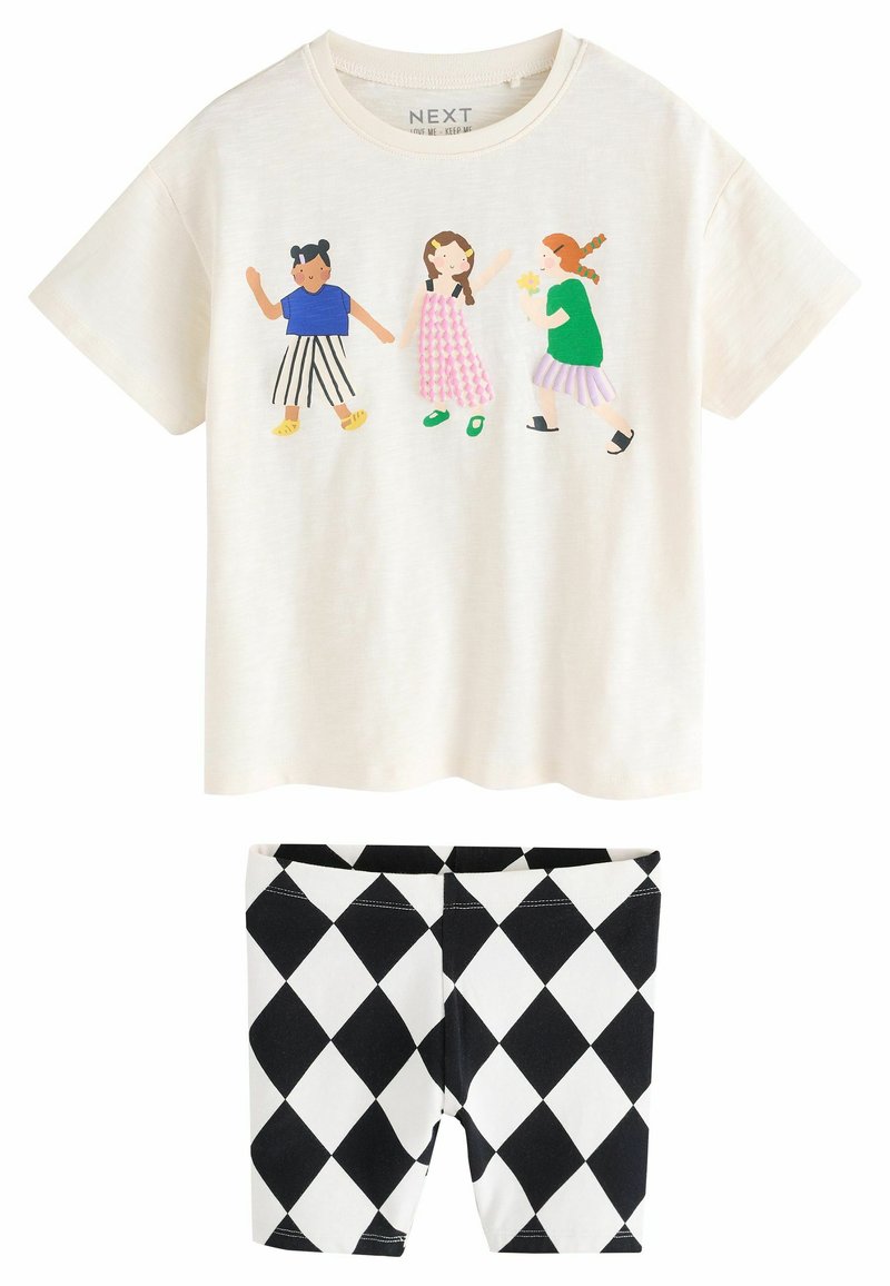 Kortärmad krämfärgad T-shirt med färgglada tecknade flickor och leggings med svart-vitt diamantmönster. Blandning av bomull, avslappnad passform.