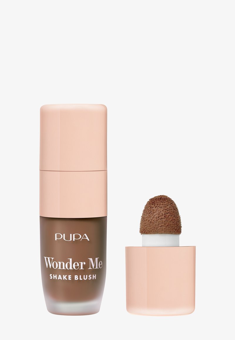 Colorete líquido Shake Blush de Pupa en un frasco marrón esmerilado con tapa rosa pálido, con un aplicador redondeado y texturizado para un uso fácil.