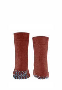 Calze rosse lavorate a maglia con polsini a coste, dotate di un motivo anti-scivolo a pois blu sulle suole per una maggiore aderenza.