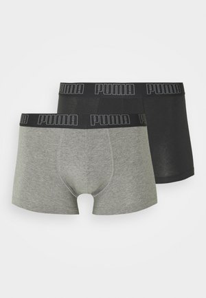 Schwarz-graue Boxershorts mit elastischem PUMA-Bund. Die grauen Shorts weisen eine Melange-Textur auf; beide haben ein enganliegendes Design und einen Schnitt bis zur Mitte des Oberschenkels.