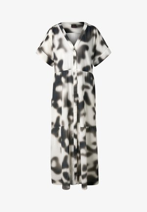 Robe maxi courte à manches courtes boutonnée, motif abstrait noir et blanc, col en V et jupe à étages.