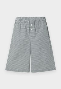 Čierne a biele šortky s gingham vzorom vyrobené z ľahkého materiálu. Majú elastický pás a predné gombíky.