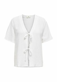 Vit kortärmad blus med djup V-ringning, frontknut och textilstruktur. Designen är lätt och löst sittande.