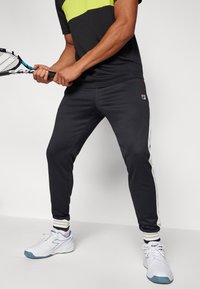 Fila PANTS BAME - Spodnji deli trenirk - black/white alyssum