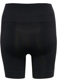 Svarta sömlösa högmidjade kompressionsshorts med ribbat detaljer vid midjan och övre lårpartiet.