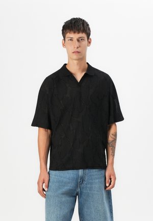 POLO TEE BOXY FIT - Polo shirt - black