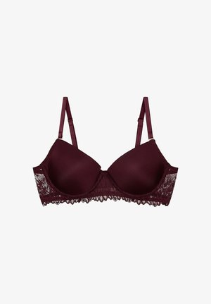 Burgundowa biustonosz z drucikami, z gładkimi satynowymi miseczkami i koronkowymi detalami na obwodzie, regulowane ramiączka oraz falbanka z koronki.