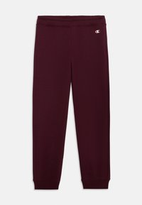 Bordeaux joggebukser med elastisk midje og manchetter, laget av mykt stoff. Har en liten logo på venstre hofte.