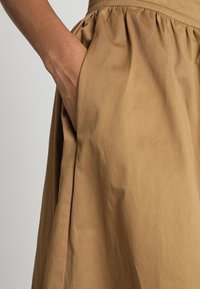 Minimum A-linjainen hame - ochre
