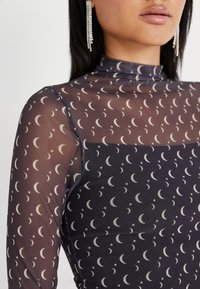 Noisy May NMLUNA HIGHNECK DRESS - Koktajl obleka/za zabavo - obsidian half moon