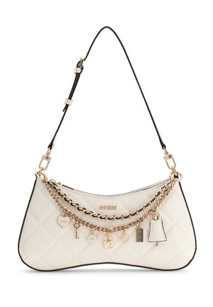 White quilted shoulder bag with gold chain and seven gold and white charms, including heart, key, lock, bell, and "GUESS" logo.