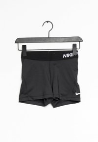 Mustat urheilushortsit, joissa on leveä joustovyötärö, valkoisella Nike-brändäyksellä ja vartalonmyötäinen muotoilu. Valmistettu sileästä ja joustavasta materiaalista.