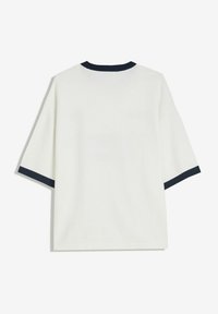 Short-sleeve white t-shirt with a navy ribbed collar and cuffs, featuring a relaxed fit and smooth texture. No patterns or accents visible.