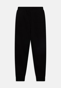 Jordan ESSENTIALS PANT UNISEX - Pantalones deportivos - black