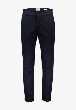 Pantaloni in cotone blu navy, slim fit, con chiusura a bottone e risvolti. Texture liscia senza motivi o accenti visibili.
