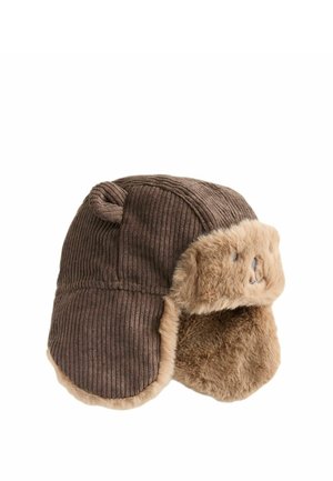 Brown corduroy trapper hat with fluffy beige fur lining and ear flaps, featuring small rounded fabric ears on top.