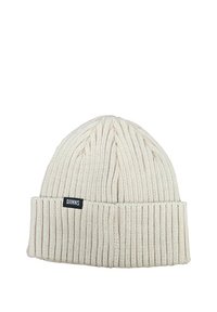 Gorro de punto color crema con diseño de canalé. Presenta un puño doblado y una pequeña etiqueta negra con el nombre de la marca "DJINNS."