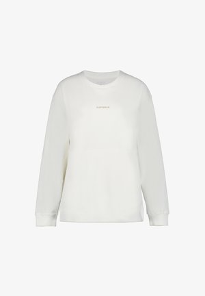 Sudadera blanca de canalé con mangas largas, cuello redondo y un sutil logo dorado en la parte frontal. Textura suave y corte relajado.