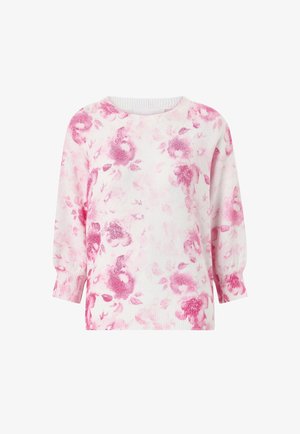 Witte gebreide trui met roze bloemenpatroon, geribbelde manchetten en zoom, met een ronde halslijn en lange mouwen.